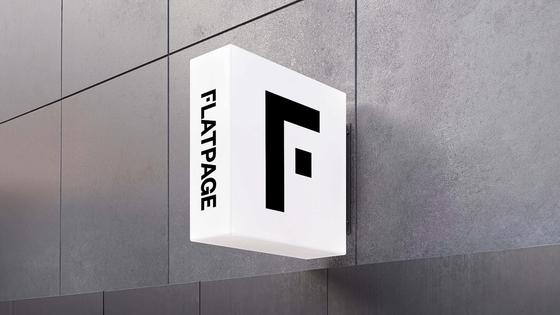 Flatpage sign hanging from a gray wall. Flatpage is an editorial agency and publishing house supporting nonfiction authors and organizations.