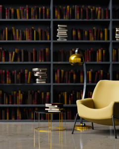 A dark library with a bright yellow chair. Several blocks of books are highlighted in the bookshelves behind, illustrating the types of nonfiction publishers available to readers.